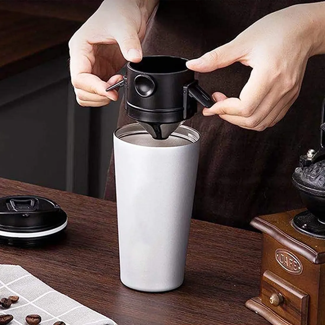 The pour over resting on a travel tumbler
